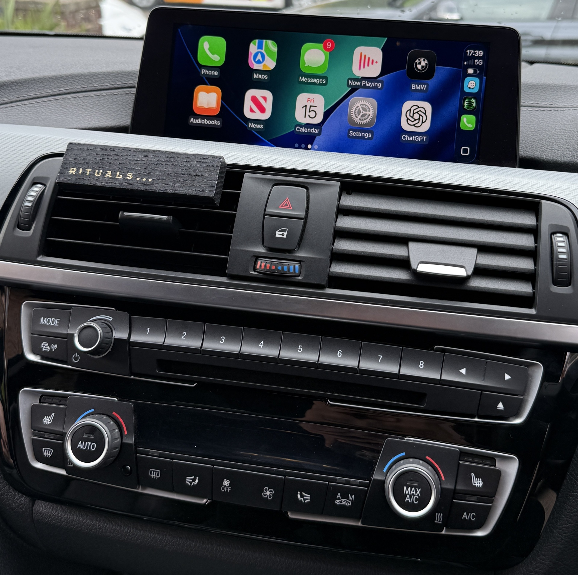 Apple CarPlay home screen on a BMW dashboard